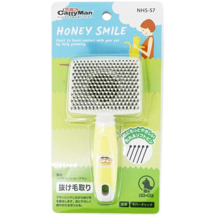 Jemný vyčesávací kartáč s kapkami pro kočky